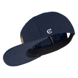 Ein Bild von einem navy blauen ChiemX Snapback Cap von der Seite